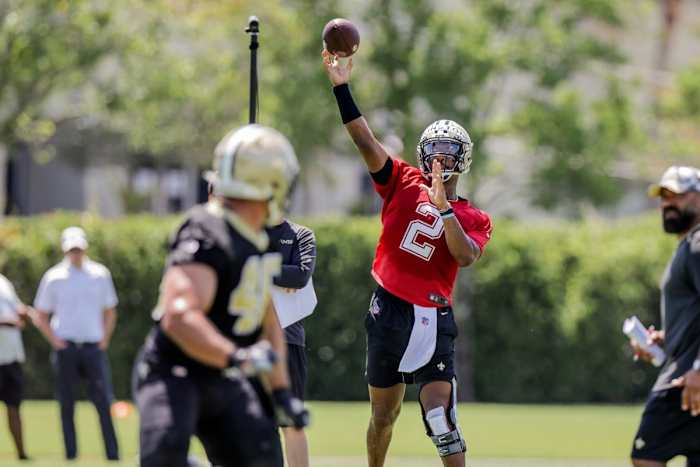 New Orleans Saints Jameis Winston (2) works on passing drills with Adam Prentice (46) during organized team activities at the Saints Training Facility. Mandatory Credit: Stephen Lew-USA TODAY Sports